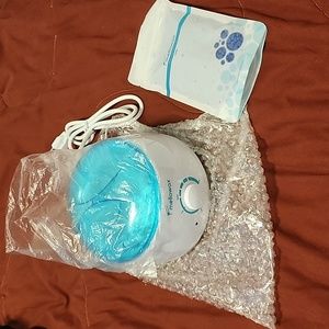 Mellowax melt pot with wax beans